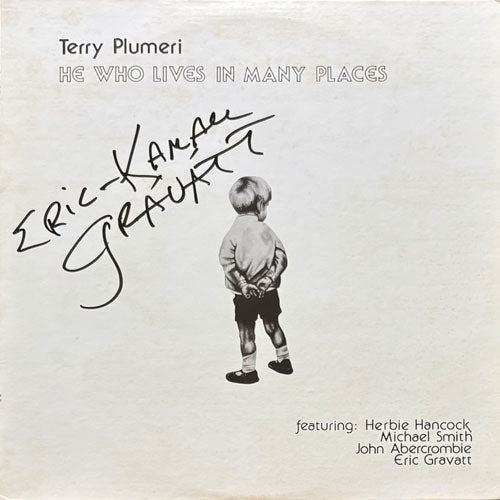TERRY PLUMERI / HE WHO LIVES IN MANY PLACES