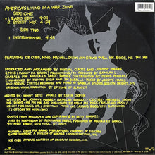 画像をギャラリービューアに読み込む, GAMILAH SHABAZZ / AMERICA'S LIVING IN A WAR ZONE
